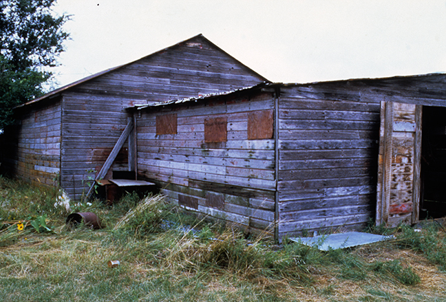 Exterior view of "The Healing Machine" shed and adjoining workshop (site view, n.d.), Garfield Table, NE. Photo: Seymour Rosen. © SPACES—Saving and Preserving Arts and Cultural Environments.