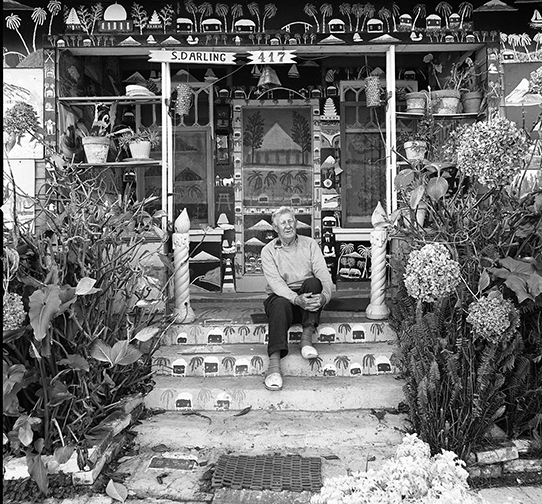 Sanford Darling at the House of 1000 Paintings (site view, n.d.), Santa Barbara, CA, c. 1963–1973. Photo: Seymour Rosen. © SPACES—Saving and Preserving Arts and Cultural Environments.