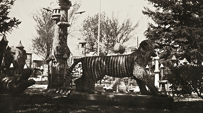 Carl Peterson yard environment (site view, tiger and various towers, c. 1930–1940), St. James, MN, c. 1925–1969. Courtesy of the Peterson family.